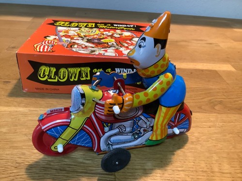 Blechspielzeug clown auf - clown,